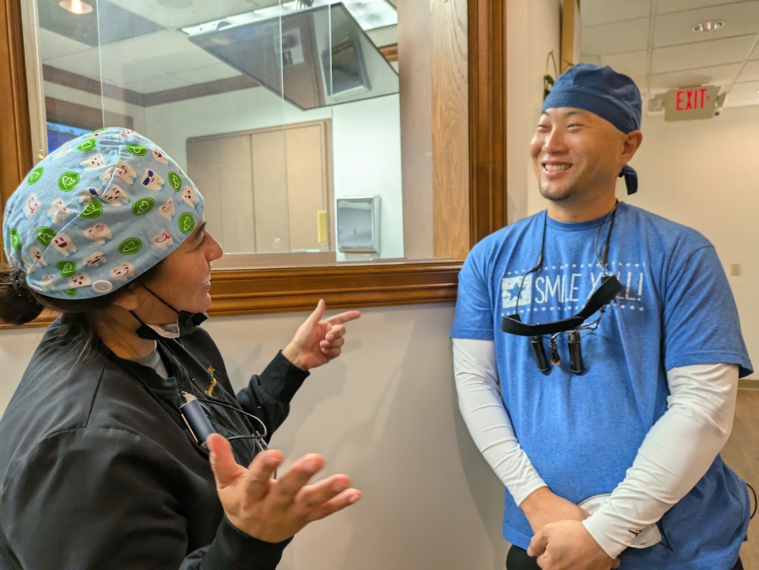 Two of the clinical team laughing between appointments